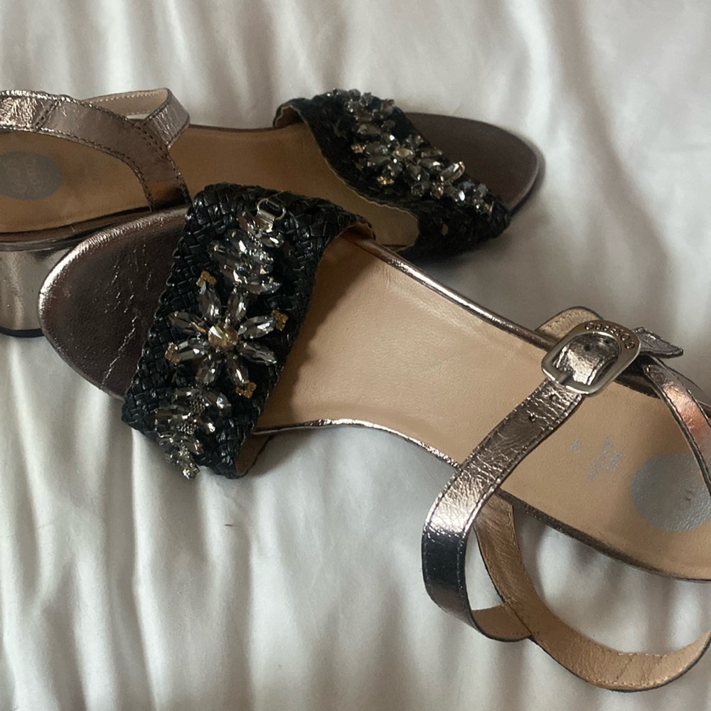 Worn once. Need slight repair of ornamental